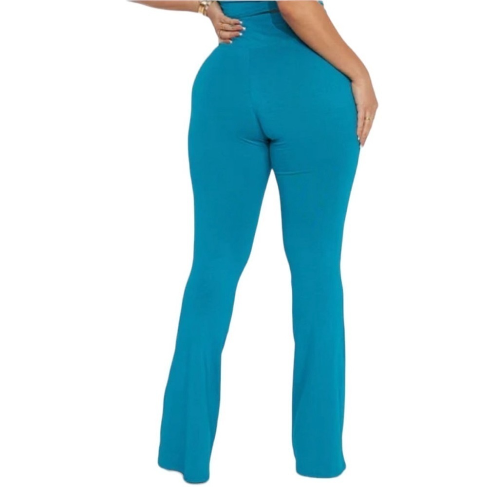 Speed Racer Teal Legging Pants
New - Picture 3 of 6